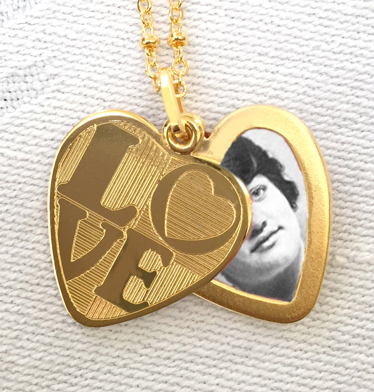 18k Gold Locket shows open slide and photo. Engraved with "Love"