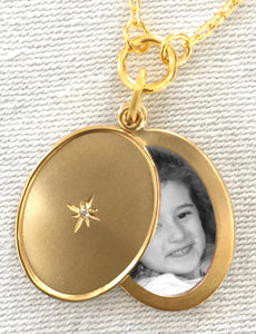 18k Gold  Oval Slide Locket Necklace closeup of open locket with photo