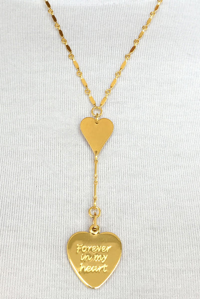 18k gold locket engraved with "Forever in my heart"