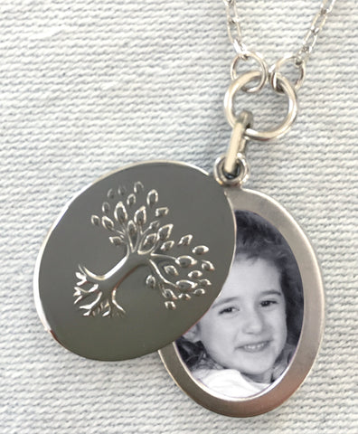 Silver Tree of Life locket. Shown open with photograph.