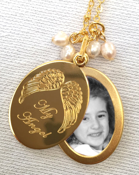 18k Gold My Angel Oval Slide Locket Necklace closeup showing open locket and photo
