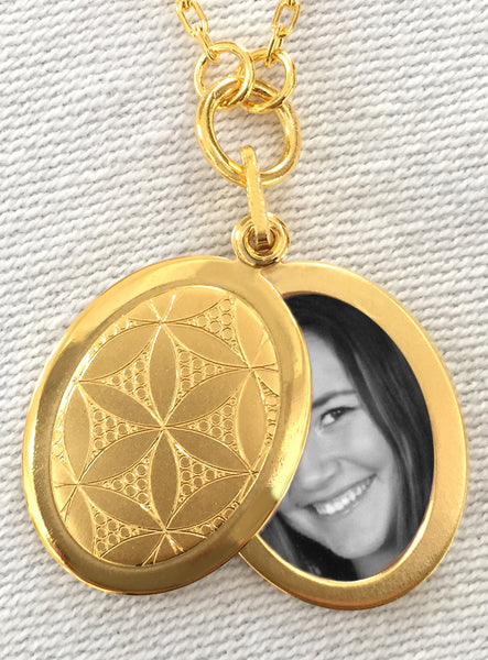 Flower of Life Oval Slide Locket Necklace closeup showing open locket and photo
